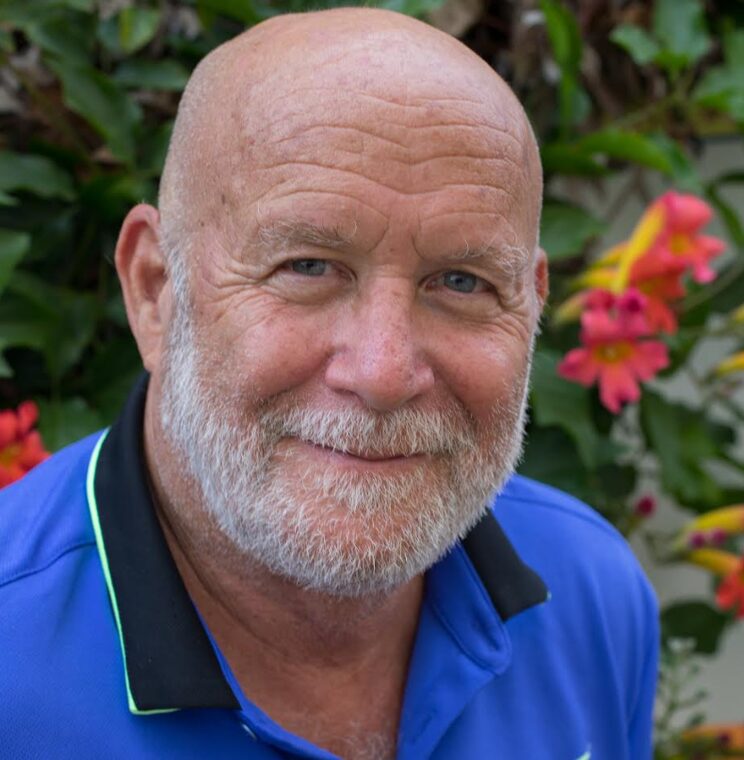 Dr. Fantastic, L. Monte Cook III, smiling in a garden